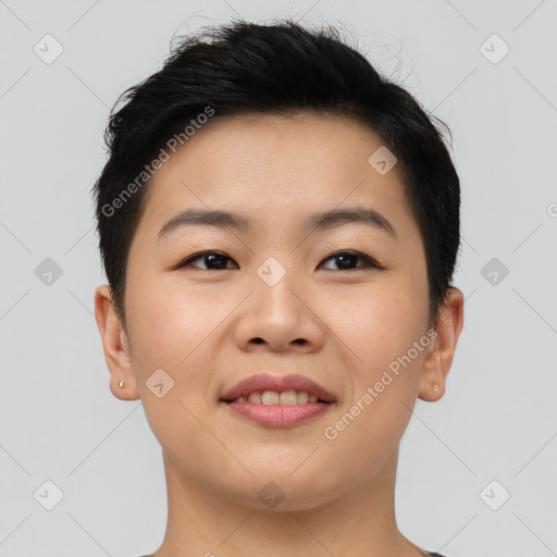 Joyful asian young-adult female with short  brown hair and brown eyes