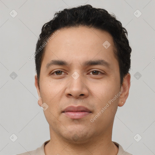 Neutral latino young-adult male with short  black hair and brown eyes