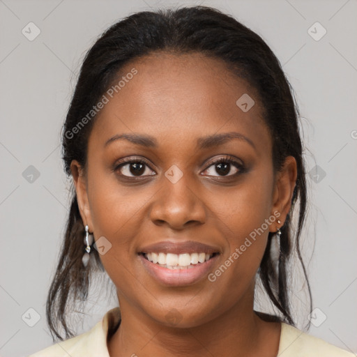 Joyful black young-adult female with medium  brown hair and brown eyes