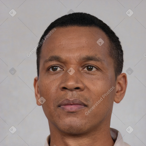 Neutral black adult male with short  black hair and brown eyes