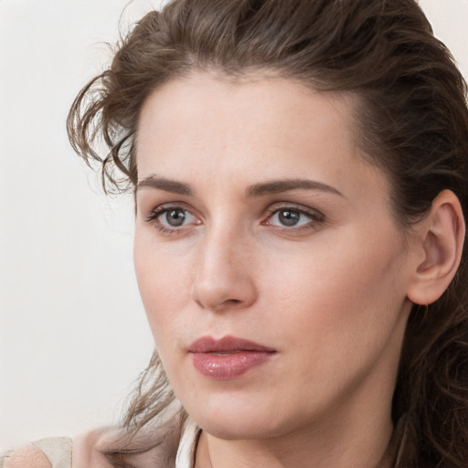 Neutral white young-adult female with long  brown hair and grey eyes