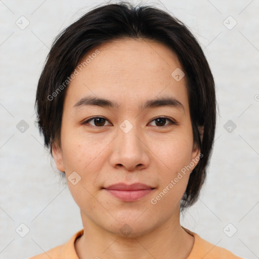 Joyful asian young-adult female with short  brown hair and brown eyes