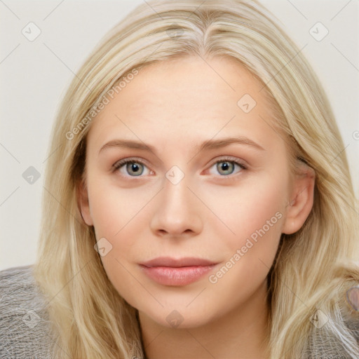 Neutral white young-adult female with long  brown hair and blue eyes