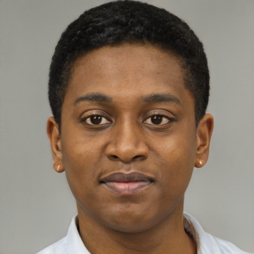 Joyful black young-adult male with short  brown hair and brown eyes