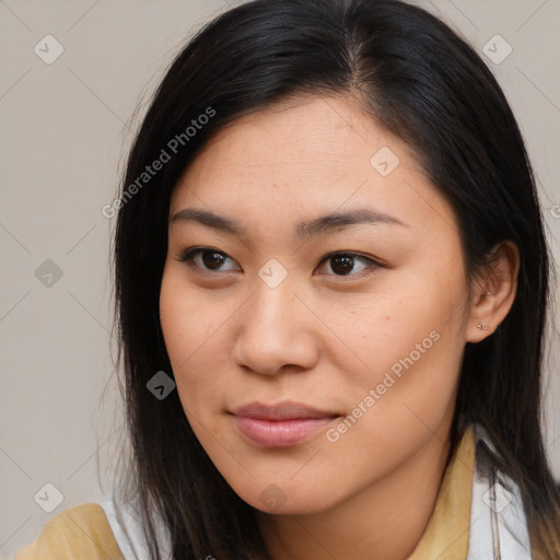 Joyful latino young-adult female with medium  brown hair and brown eyes