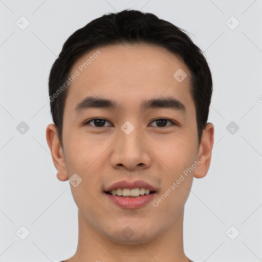 Joyful asian young-adult male with short  black hair and brown eyes