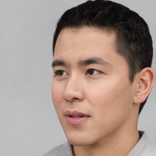 Neutral asian young-adult male with short  black hair and brown eyes