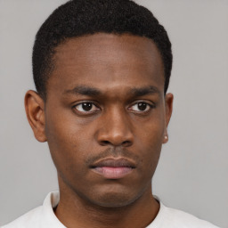 Neutral black young-adult male with short  brown hair and brown eyes