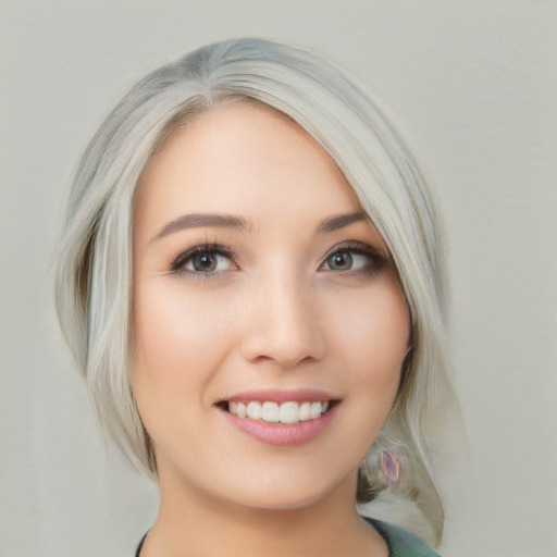 Joyful white young-adult female with medium  blond hair and brown eyes