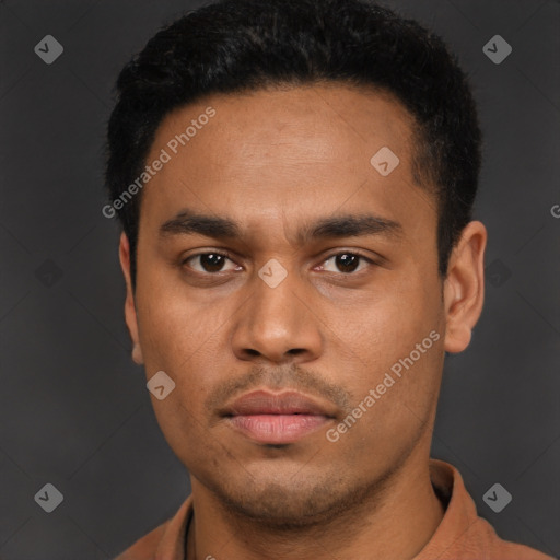 Neutral latino young-adult male with short  black hair and brown eyes