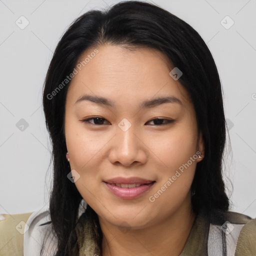 Joyful asian young-adult female with medium  brown hair and brown eyes