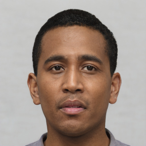 Neutral black young-adult male with short  black hair and brown eyes