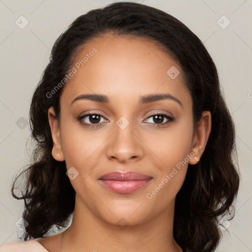 Joyful latino young-adult female with long  brown hair and brown eyes