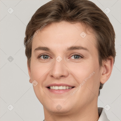 Joyful white young-adult female with short  brown hair and grey eyes