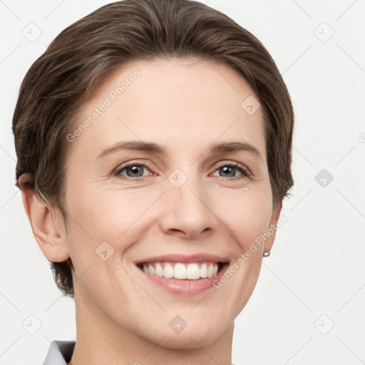 Joyful white young-adult female with short  brown hair and grey eyes