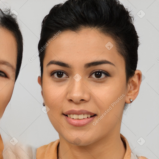 Joyful asian young-adult female with short  brown hair and brown eyes