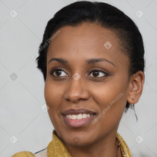 Joyful latino young-adult female with medium  brown hair and brown eyes