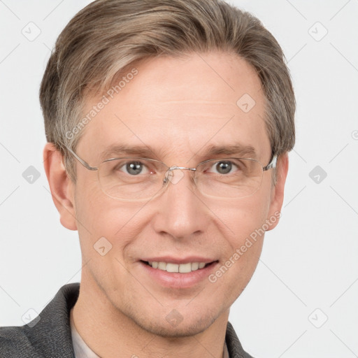 Joyful white adult male with short  brown hair and grey eyes