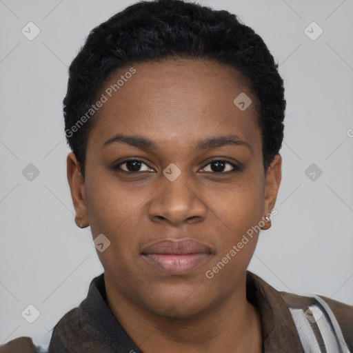 Joyful black young-adult female with short  black hair and brown eyes