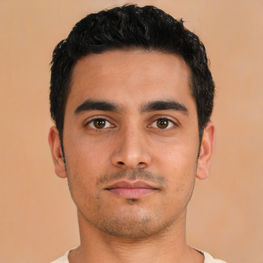Neutral latino young-adult male with short  black hair and brown eyes