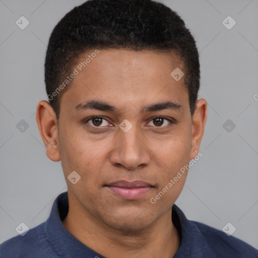 Joyful latino young-adult male with short  brown hair and brown eyes