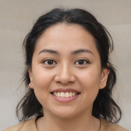 Joyful asian young-adult female with medium  brown hair and brown eyes