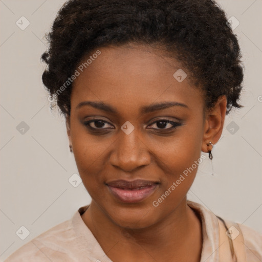 Joyful black young-adult female with short  black hair and brown eyes