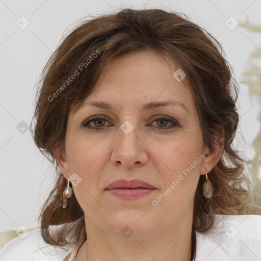 Joyful white adult female with medium  brown hair and grey eyes