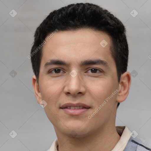 Joyful white young-adult male with short  black hair and brown eyes