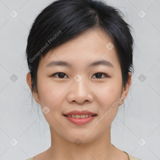 Joyful asian young-adult female with medium  black hair and brown eyes