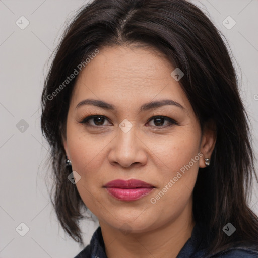Joyful white adult female with medium  brown hair and brown eyes