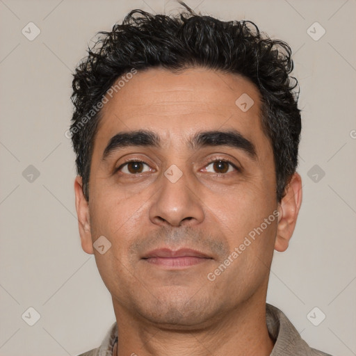 Neutral white young-adult male with short  black hair and brown eyes
