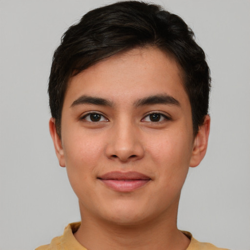 Joyful asian young-adult male with short  brown hair and brown eyes