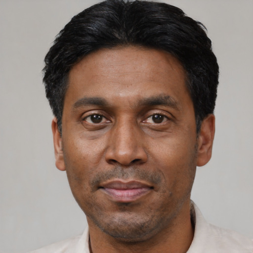 Neutral asian adult male with short  black hair and brown eyes