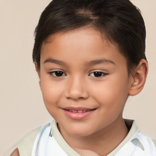 Joyful white child female with short  brown hair and brown eyes