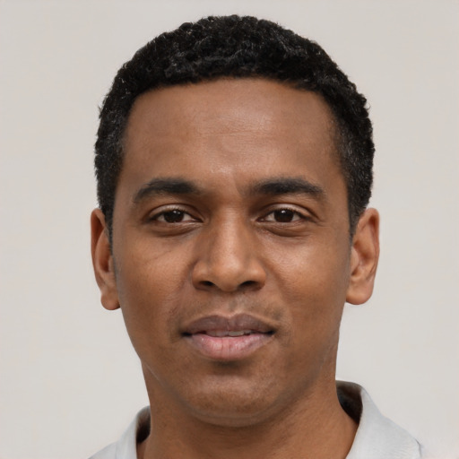 Neutral black young-adult male with short  black hair and brown eyes