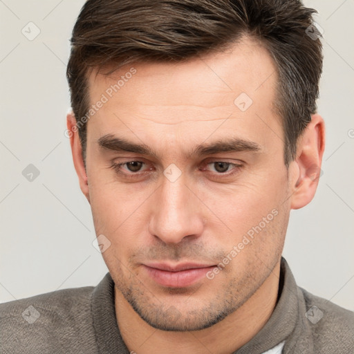 Neutral white young-adult male with short  brown hair and brown eyes