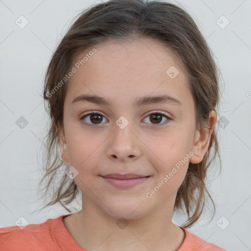 Joyful white child female with medium  brown hair and brown eyes