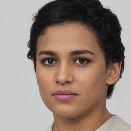 Neutral latino young-adult female with short  brown hair and brown eyes