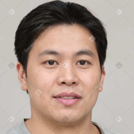 Joyful white young-adult male with short  brown hair and brown eyes