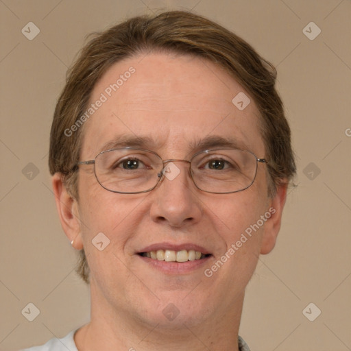 Joyful white adult male with short  brown hair and green eyes