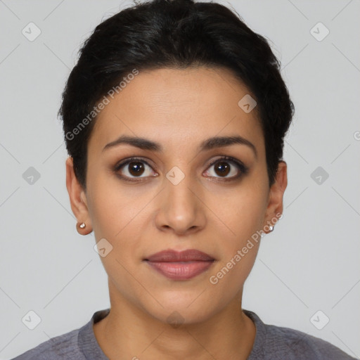 Joyful latino young-adult female with short  black hair and brown eyes