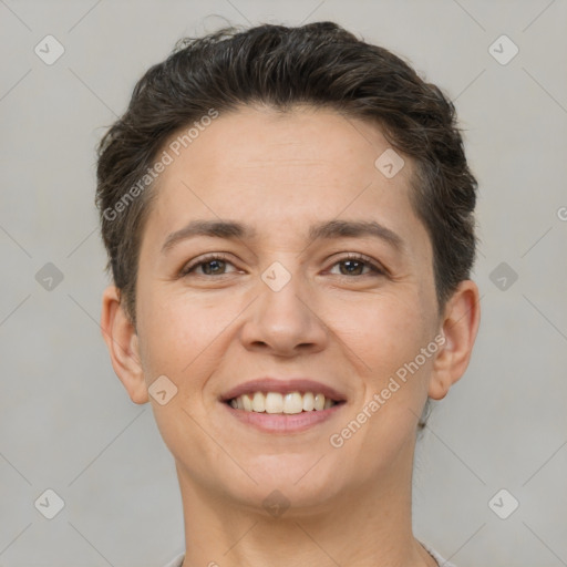 Joyful white young-adult female with short  brown hair and brown eyes