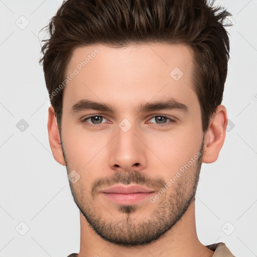 Neutral white young-adult male with short  brown hair and brown eyes