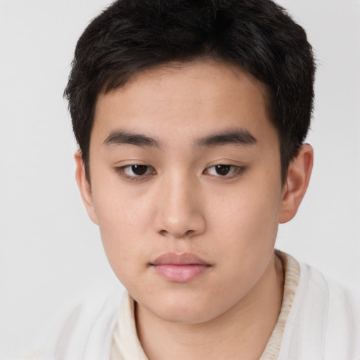 Neutral asian young-adult male with short  brown hair and brown eyes