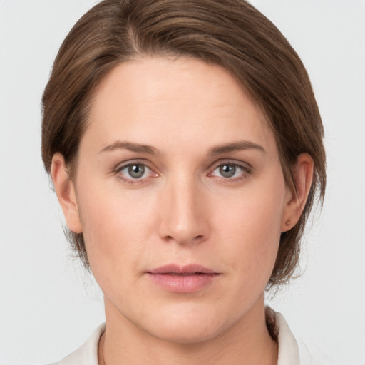 Neutral white young-adult female with short  brown hair and grey eyes