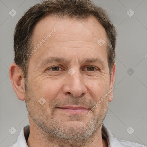 Joyful white middle-aged male with short  brown hair and brown eyes