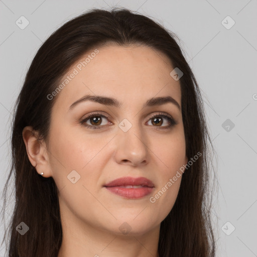 Joyful white young-adult female with long  brown hair and brown eyes