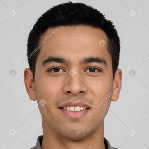 Joyful latino young-adult male with short  black hair and brown eyes