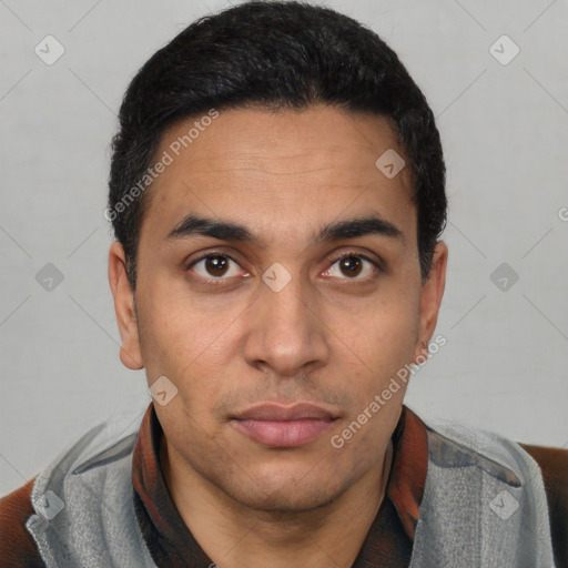 Neutral latino young-adult male with short  black hair and brown eyes